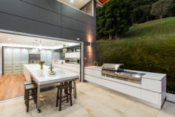 outdoor-barbecue-area-in-white-combined-with-high-end-kitchen-appliances