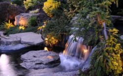 beautiful-outdoor-lighting-waterfall-rocks-modern-garden-design