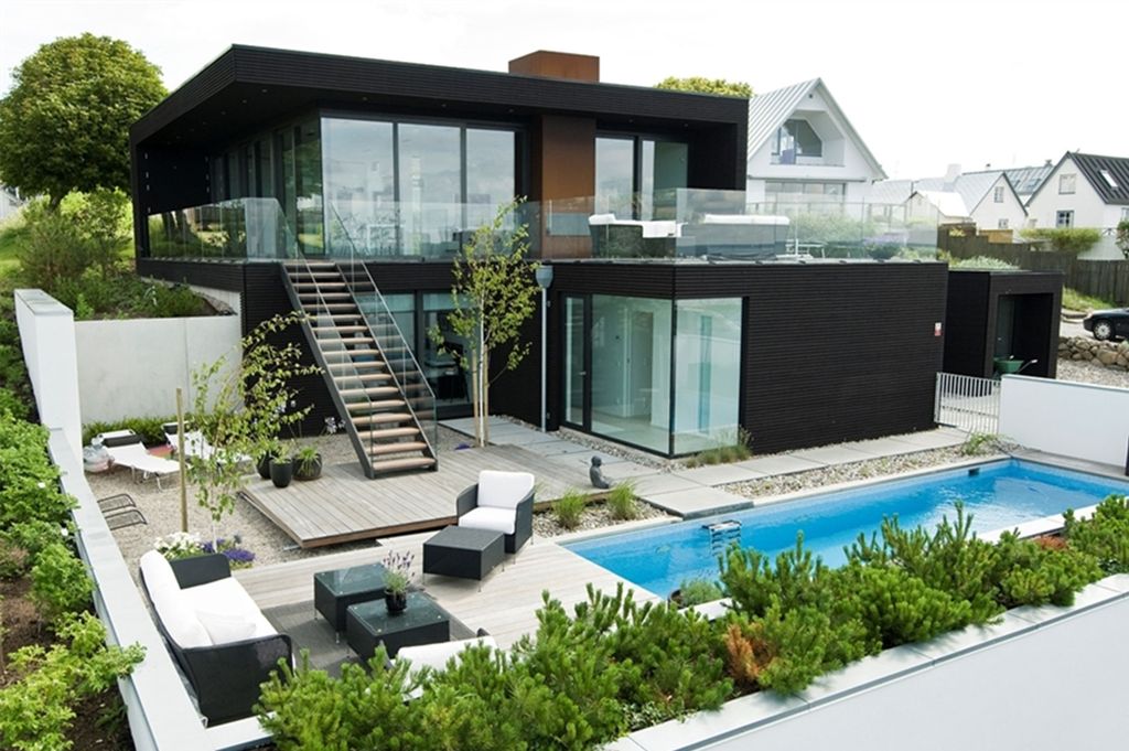 Modern villa house exterior design with glass fence and wooden staircase and white leather sofa also blue deep water pool idea