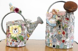 Decorated watering cans made by Mosaic artist Bonnie Arkin (CQ) is one of the many garden pieces that can be covered with a mosaic. Arkin (CQ) will be teaching a mosaic class at the Chicago Botanic Garden in Glencoe, Ill.(Lane Christiansen / Chicago Tribune)