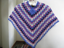 89-6-Crocheted-Poncho-with-blossom-by-DROPS-design