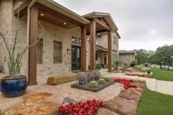great-combo-of-rustic-architectural-and-contemporary-entry-door-with-lovely-bonus-of-cacti-and-succulent-landscaping-to-create-perfect-balance-from-Sterling-Brook-Custom-Homes-728x484