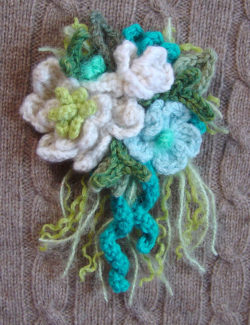 crochet_corsage_turquoise_by_meekssandygirl