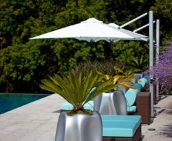 Stylish-Patio-Umbrellas-look-Toronto-Contemporary-Pool-Innovative-Designs-with-chaise-lounge-container-plants-660x540