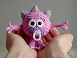 crochet baby monster with pacifier