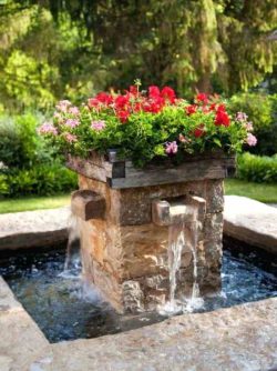 rustic-water-fountain-beautiful-rustic-stone-outdoor-patio-water-fountain-with-nice-flower-on-the-top-rustic-cave-water-fountain