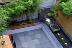 Contemporary-couryard-water-feature-bamboo-grass1-582x391