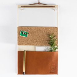 Witshop_hanging_organiser_with_brown_tan_leather_pocket_notepad_and_cork_board_Oates_Co_1024x1024